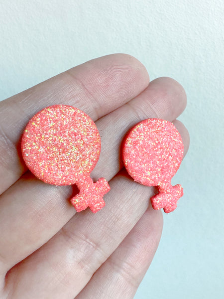 Små kvinnotecken, rosaglittriga