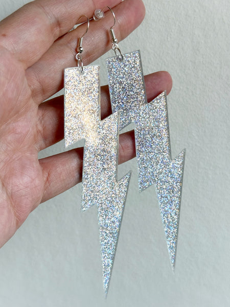 Örhängen blixt, glittriga
