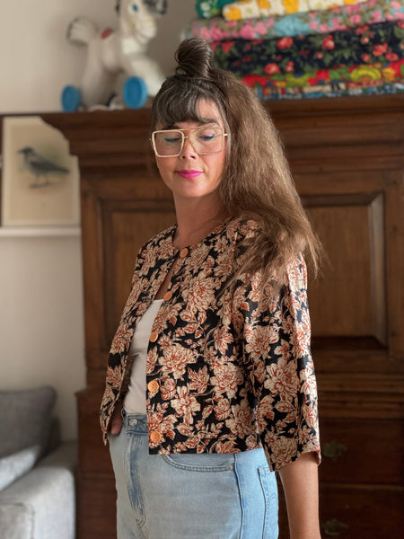 Blusjacka i linnetyg