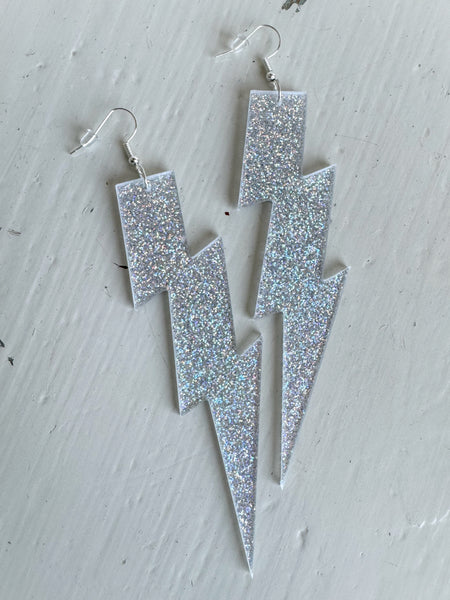 Örhängen blixt, glittriga