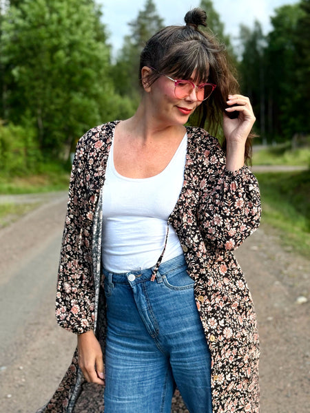 Långklänning svart med beiga blommor