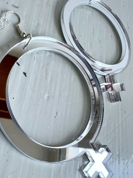 Örhängen,  silvriga kvinnotecken