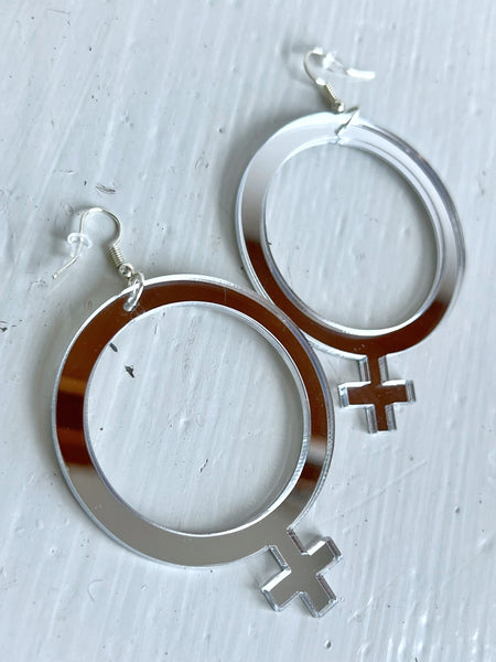 Örhängen,  silvriga kvinnotecken