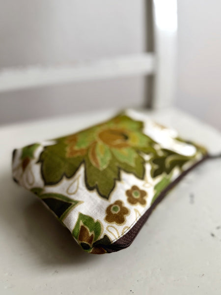 Necessär med gröna medaljonger