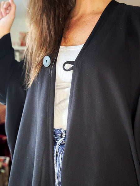 Sjok / kaftan i collagetyg, enfärgat svart