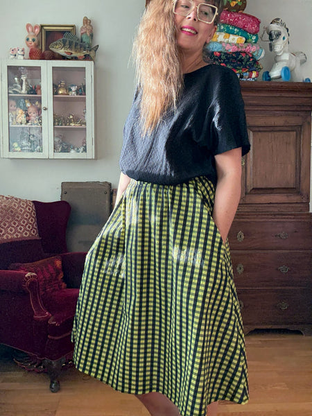 Kjol rutig i svart & ljusgrönt