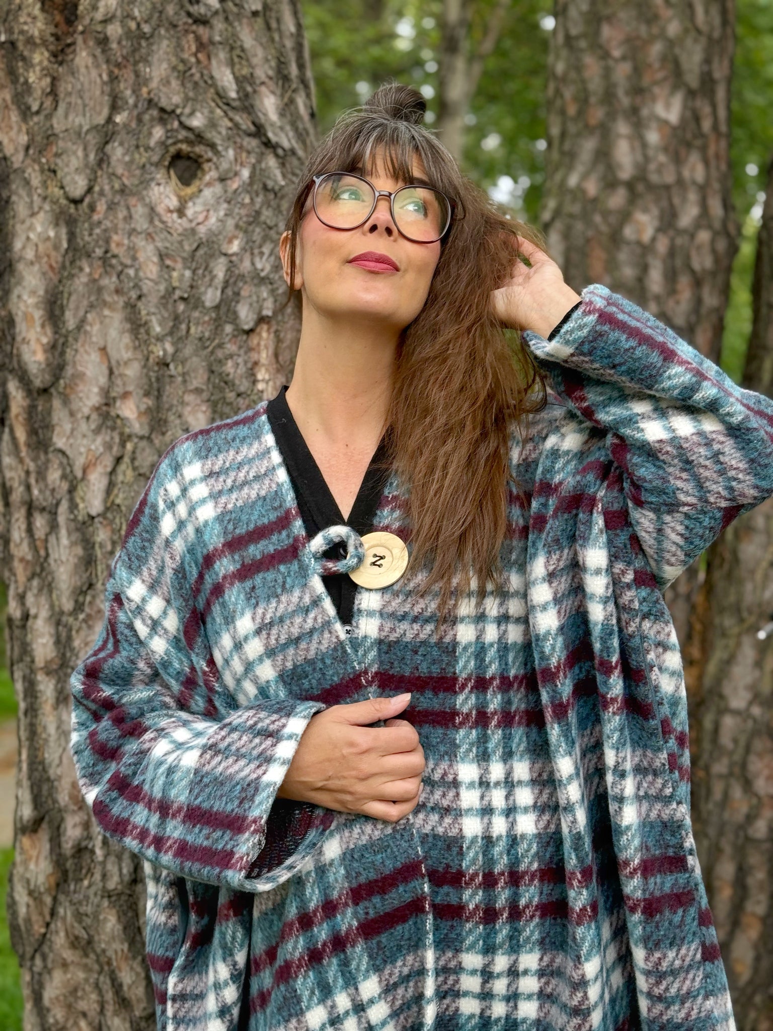 Petrolfärgad kappa i ullmix med rutor