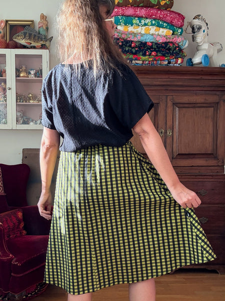 Kjol rutig i svart & ljusgrönt