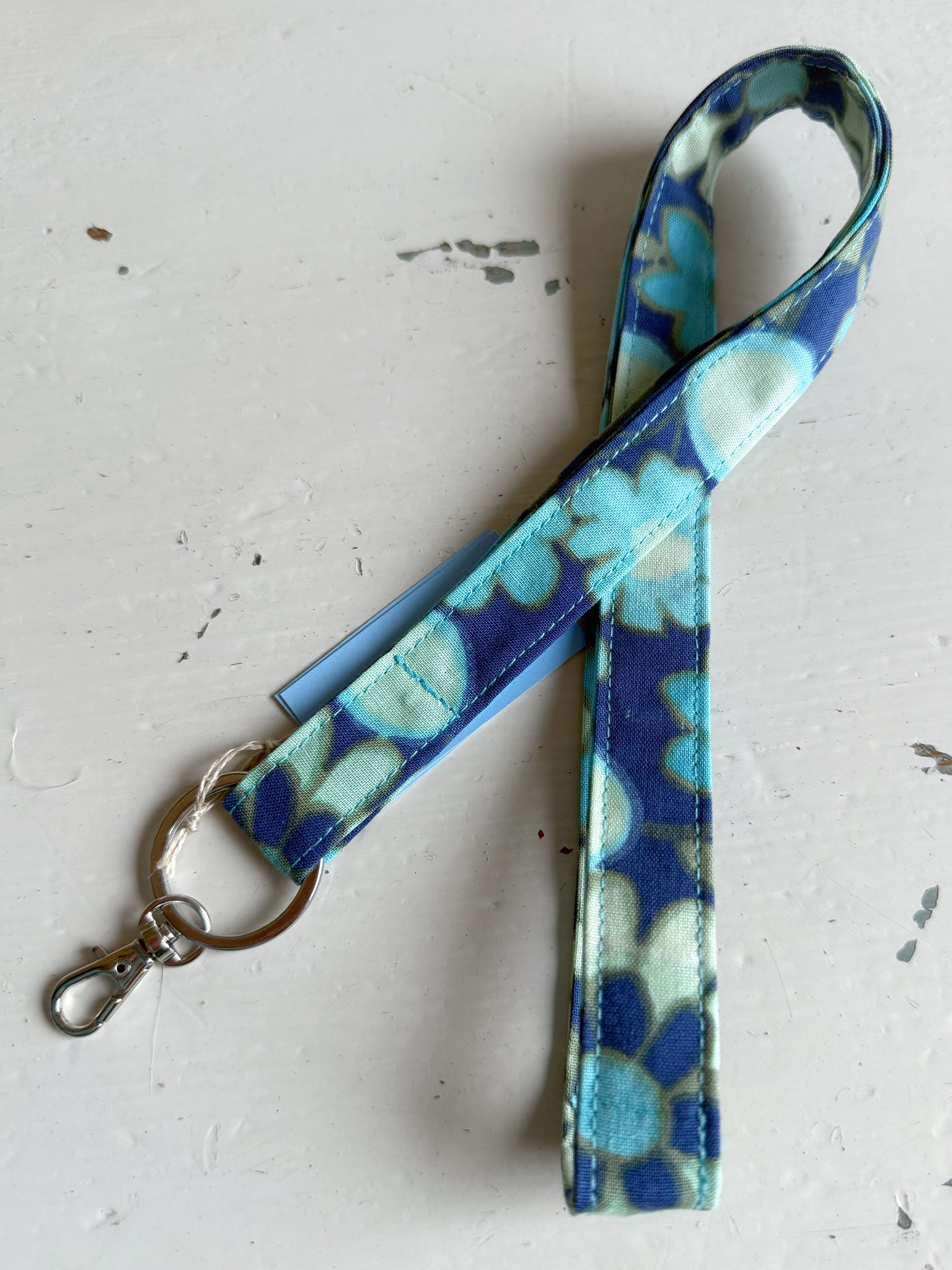 Nyckelband i blått vintagetyg