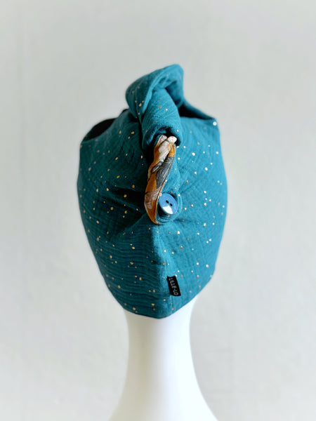 Turban i petrol med guldprickar