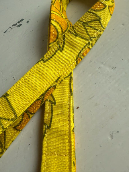 Nyckelband i gult vintagetyg