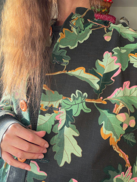 Kappa i återbrukad bomull, eklöv. Stl M