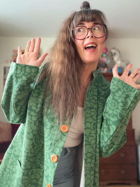 Kappa i återbrukad bomull, grön. Stl L