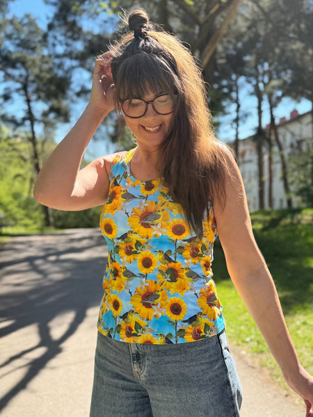 Linne med solrosor & fåglar