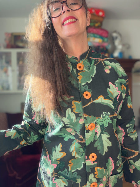 Kappa i återbrukad bomull, eklöv. Stl M