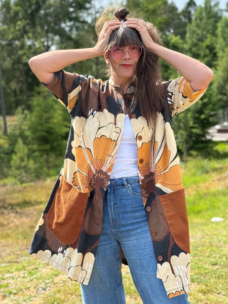 Städrock i vintagetyg i bruna nyanser. Stl S