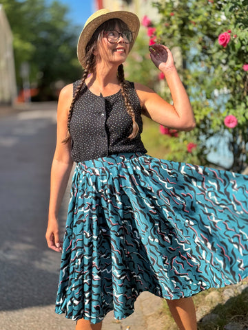 Vid kjol i blågrön bomullssatin