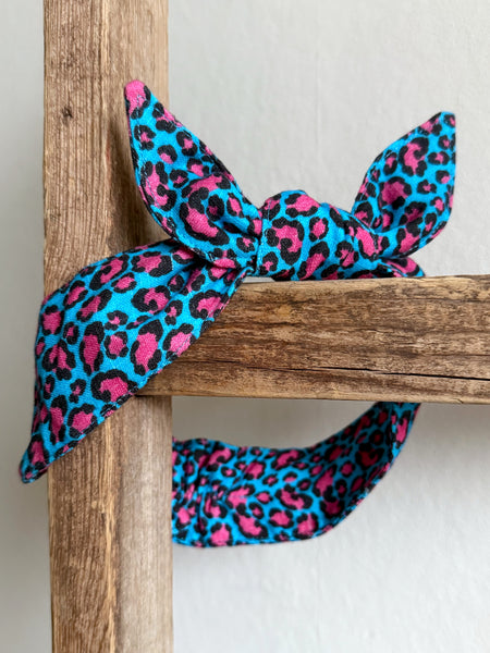 Hårband i turkos & cerise leopardmönster