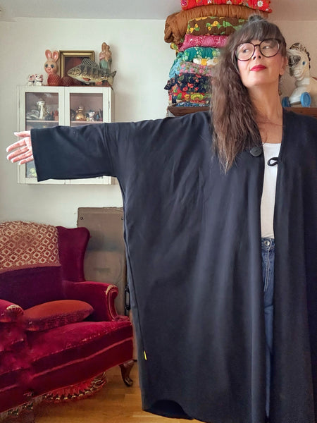 Sjok / kaftan i collagetyg, enfärgat svart