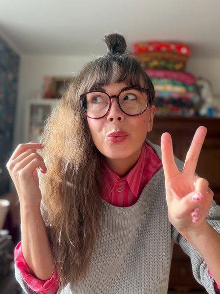 Stickad tröja ljusgrå