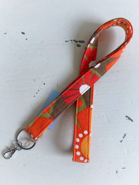 Nyckelband orange & brunt