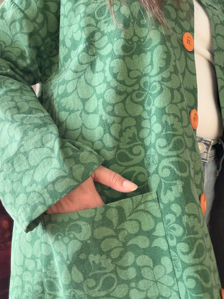 Kappa i återbrukad bomull, grön. Stl L