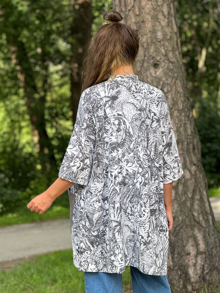 Städrock i återbrukad bomull med djur, stl S