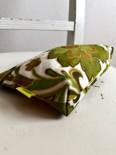 Necessär med gröna medaljonger