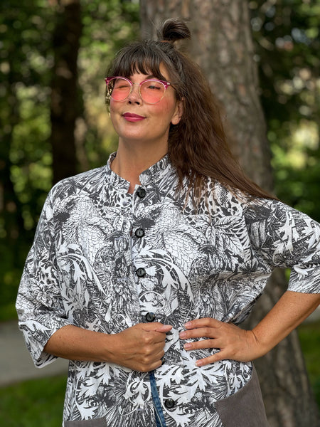 Städrock i återbrukad bomull med djur, stl S