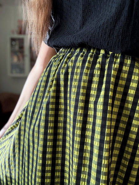 Kjol rutig i svart & ljusgrönt