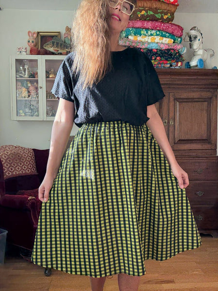Kjol rutig i svart & ljusgrönt