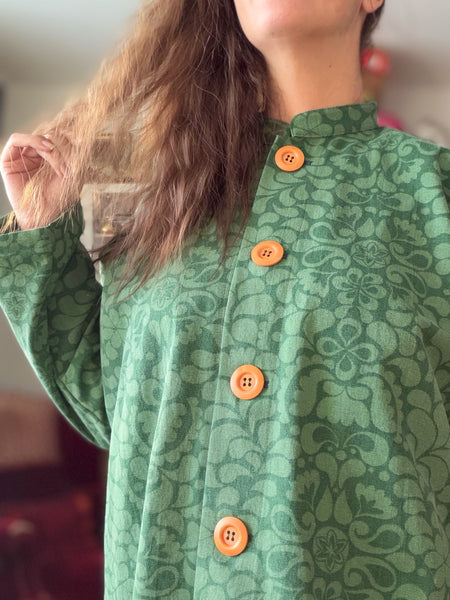 Kappa i återbrukad bomull, grön. Stl L